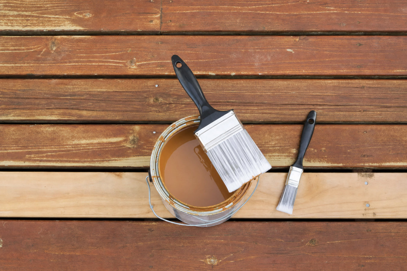 Deck staining and sealing